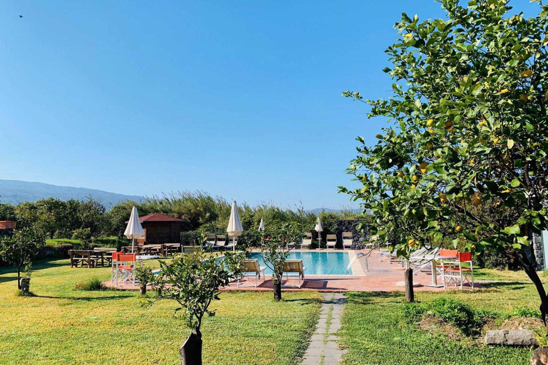 Agriturismo among citrus trees in Sicily